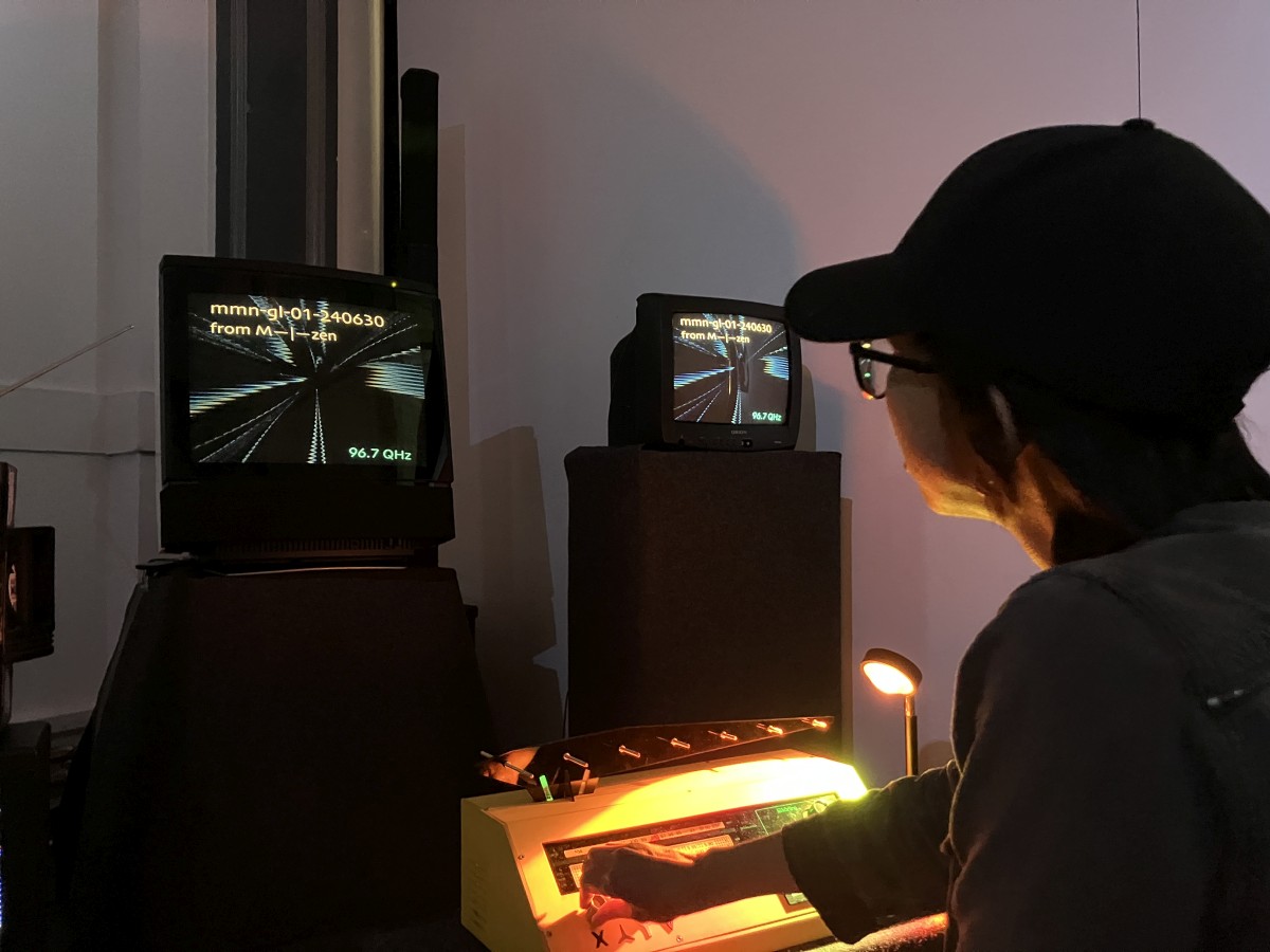 A person exploring transmissions on the Intergalactic Receiver